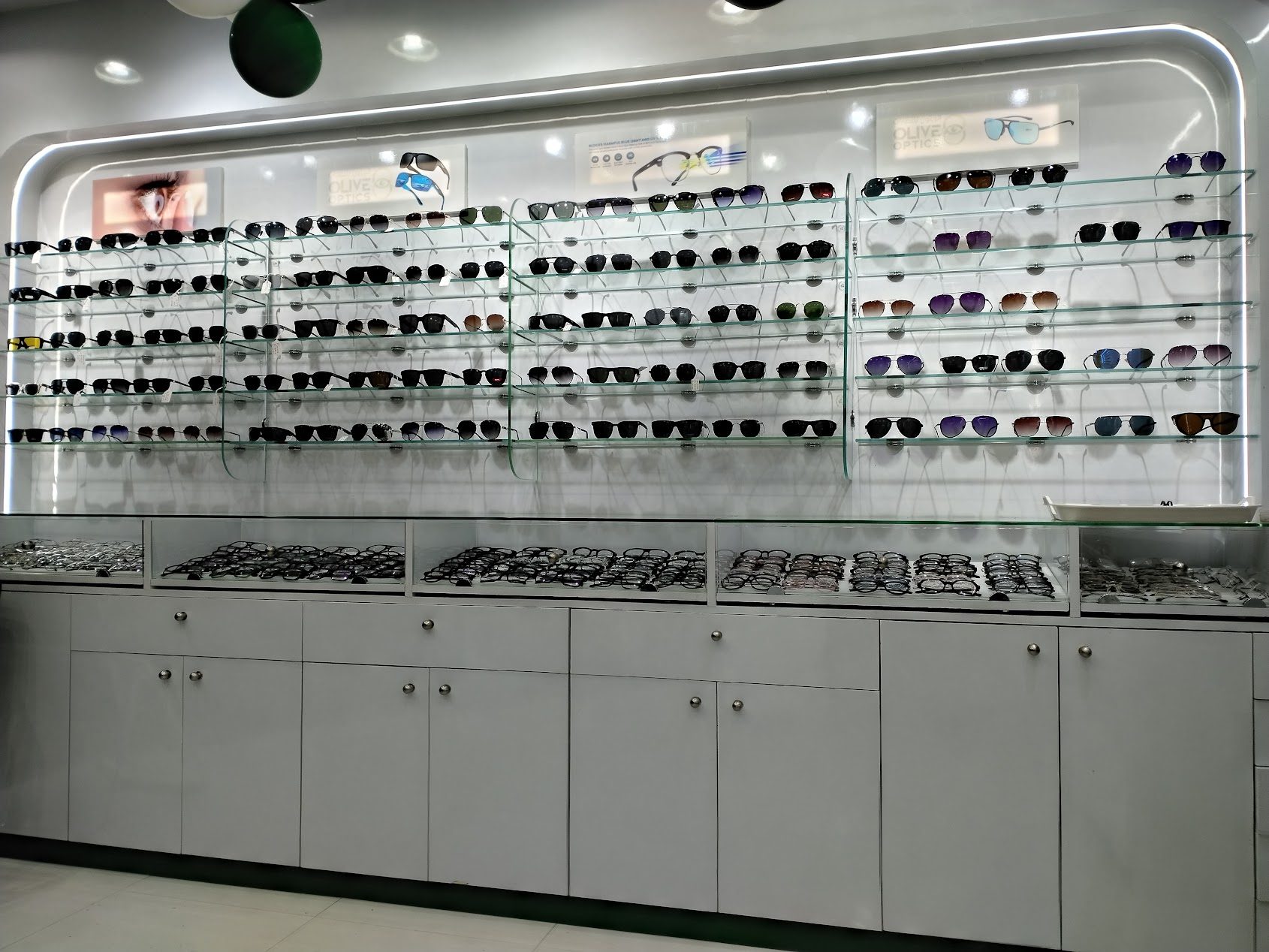 Olive Optics Sharjah sunglasses display wall